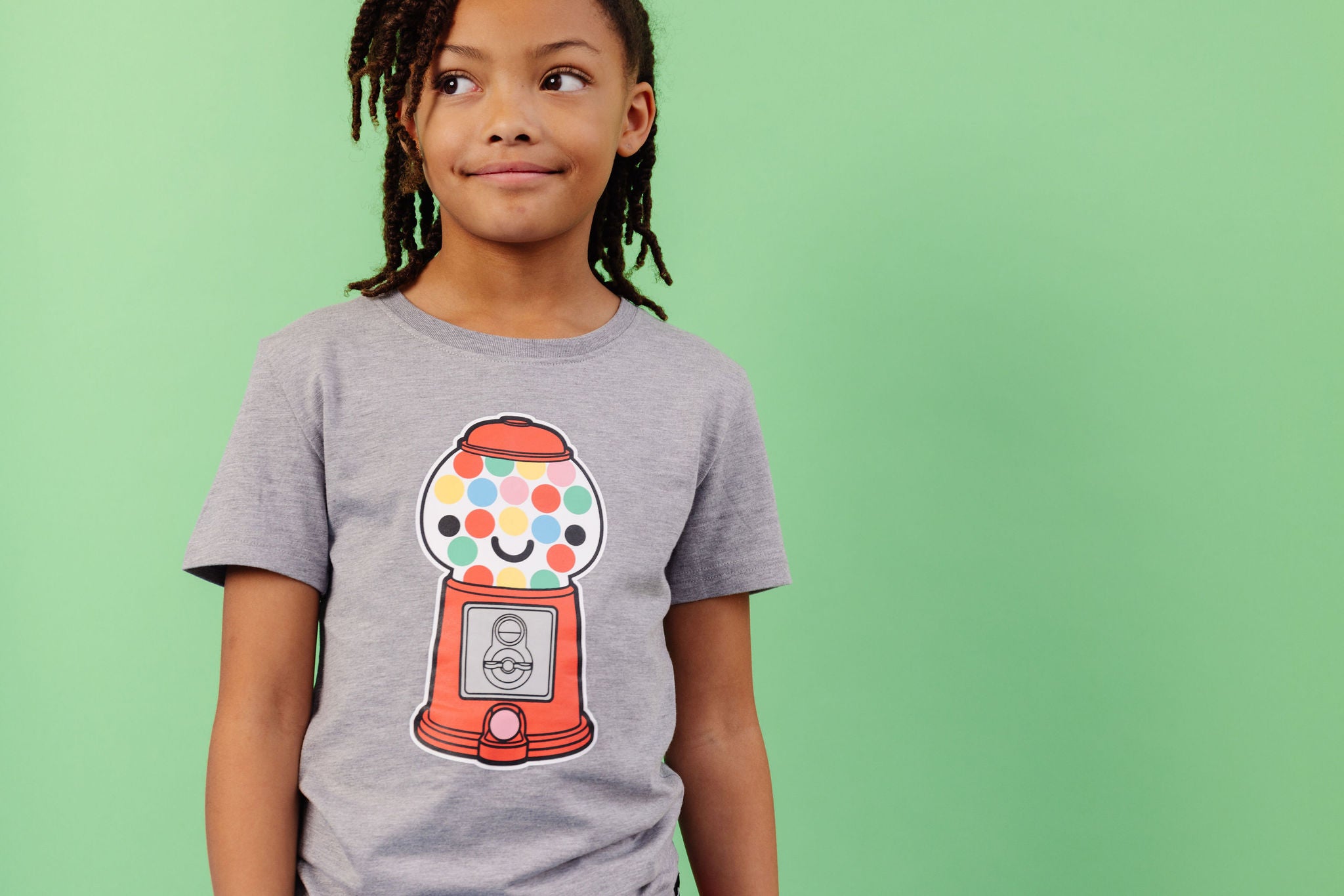 Gender Neutral Kawaii Gumball Machine design screen printed in full colour on an organic athletic grey t-shirt. Designed in Canada. Ethically Made