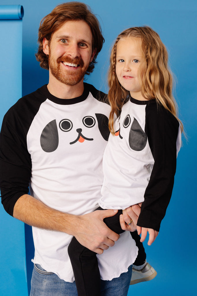 Kawaii Puppy Dog Eyes face printed in black with pink tongue on 100% organic cotton two-tone black and white baseball t-shirt. Paired with BEST bamboo joggers in black. Gender Neutral and available in kids and adult sizes. Designed in Canada.
