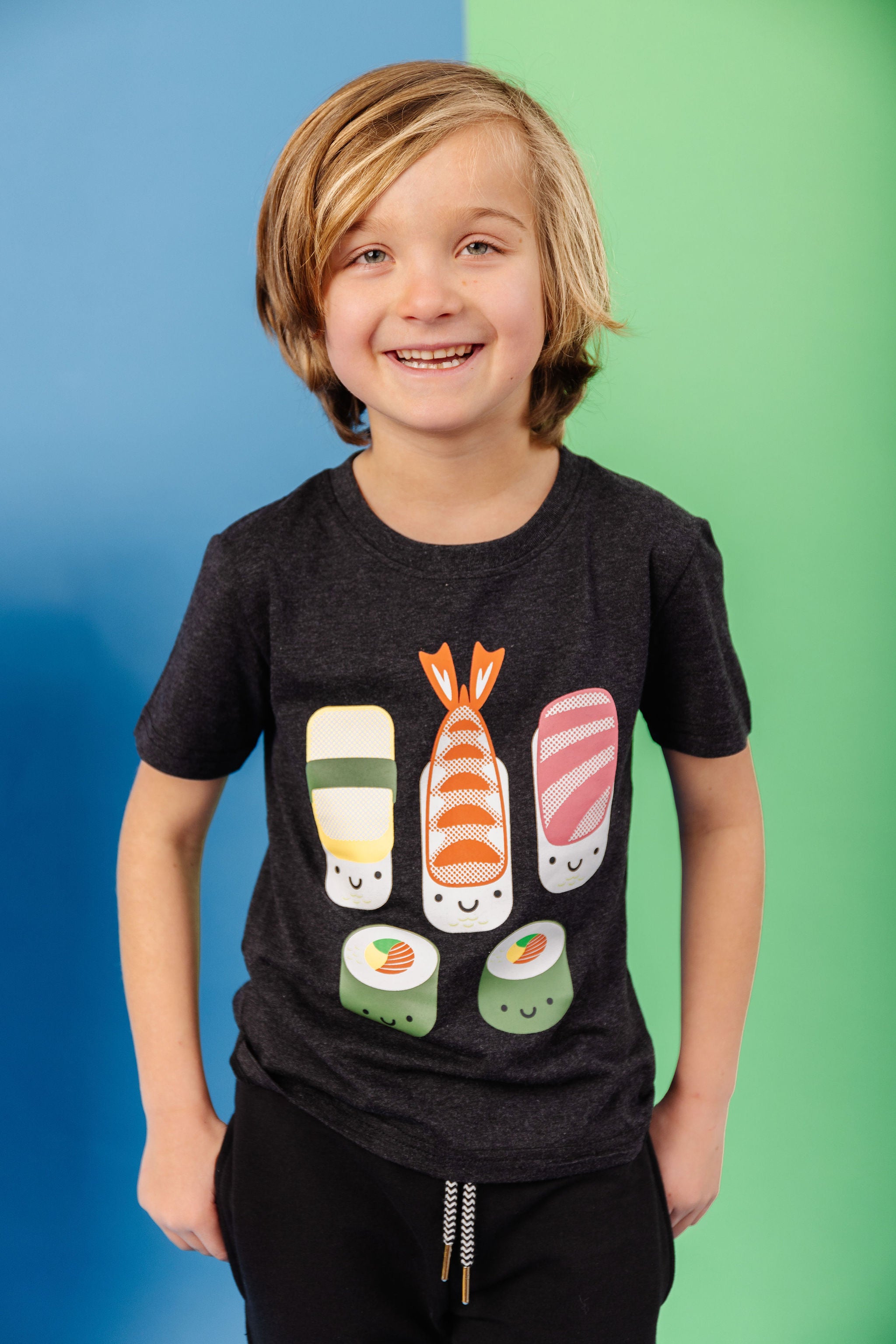 Kawaii Sushi design is printed in colour on organic charcoal heather grey t-shirt. Paired with bamboo drawstring joggers in black. Gender Neutral and available in kids and adult sizes. Designed in Victoria, BC Canada.