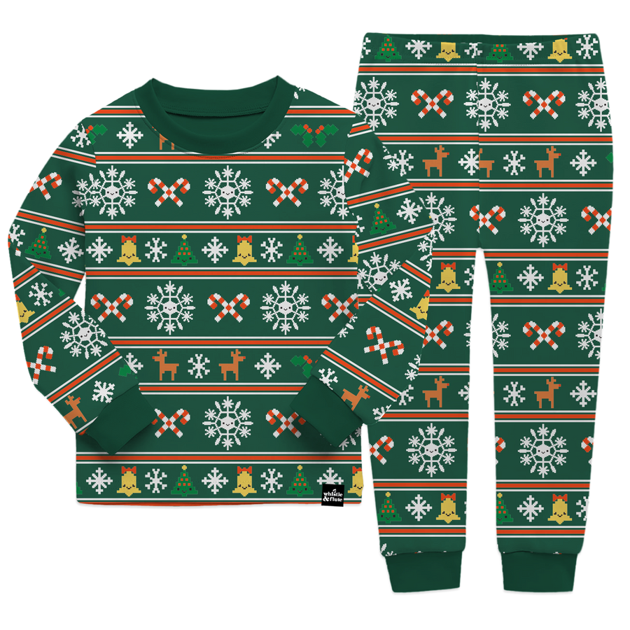 Whistle & Flute Nordic Pyjama Set - Unisex  pyjamas with a Nordic-style pattern including snowflakes and festive icons.