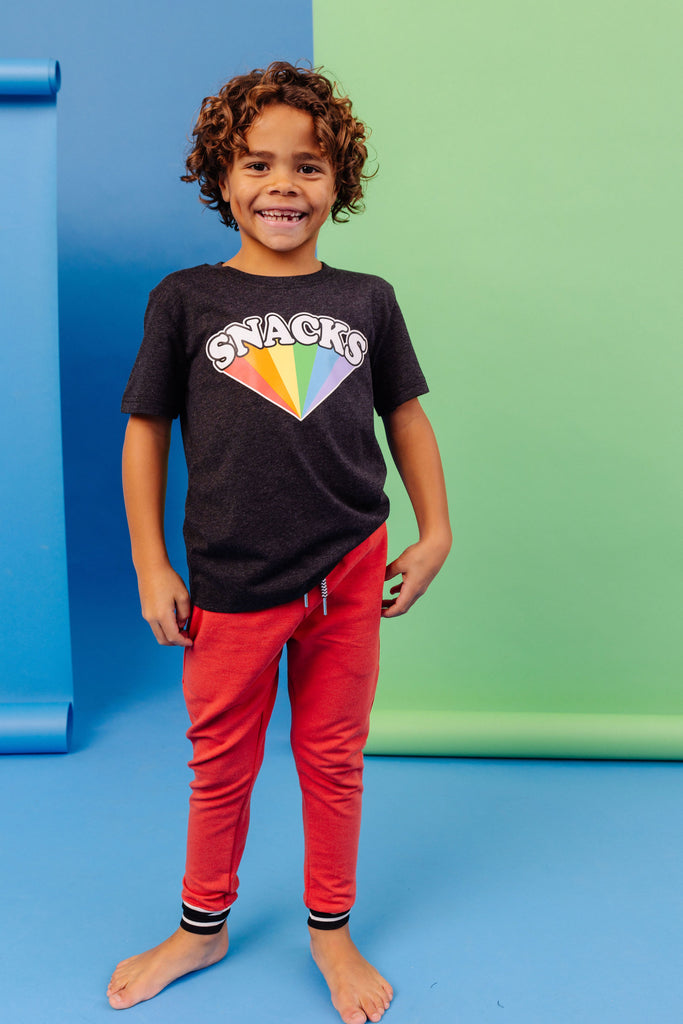 SNACKS Rainbow design printed on organic charcoal heather grey t-shirt. Paired with BEST bamboo joggers in red. Gender Neutral and available in kids and adult sizes. 