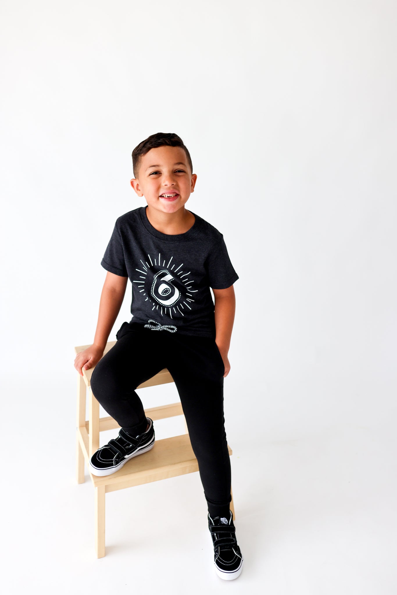 Milestone 6 t-shirt screen printed in white on an organic charcoal heather grey t-shirt. Gender-free.