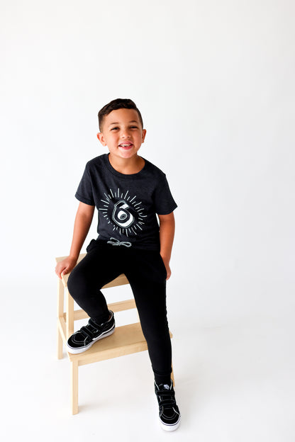 Milestone 6 t-shirt screen printed in white on an organic charcoal heather grey t-shirt. Gender-free.