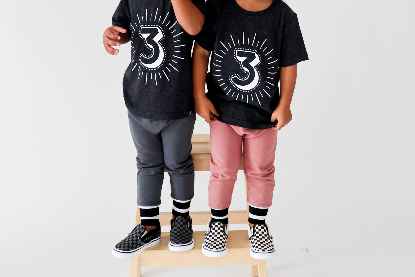 Milestone 3 t-shirt screen printed in white on an organic charcoal heather grey t-shirt. Gender-free.