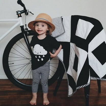 White Kawaii Raincloud design screen printed on an organic charcoal heather grey t-shirt. Available in kids and adult sizes. Gender Neutral and ethically made. Designed in Canada.